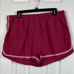Eleven rose colored athletic shorts with pink trim size XL. Elastic waistband